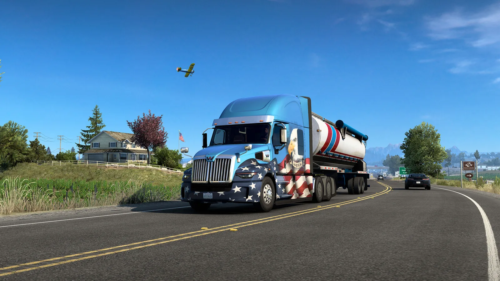 Тягач с тематической раскраской на сельской дороге в American Truck Simulator